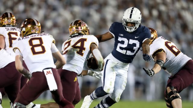 Oct 22, 2022; University Park, Pennsylvania, USA; Penn State Nittany Lions linebacker Curtis Jacobs (23) pressures Minnesota Golden Gophers running back Mohamed Ibrahim (24) during the third quarter at Beaver Stadium. Penn State defeated Minnesota 45-17. Mandatory Credit: Matthew OHaren-USA TODAY Sports